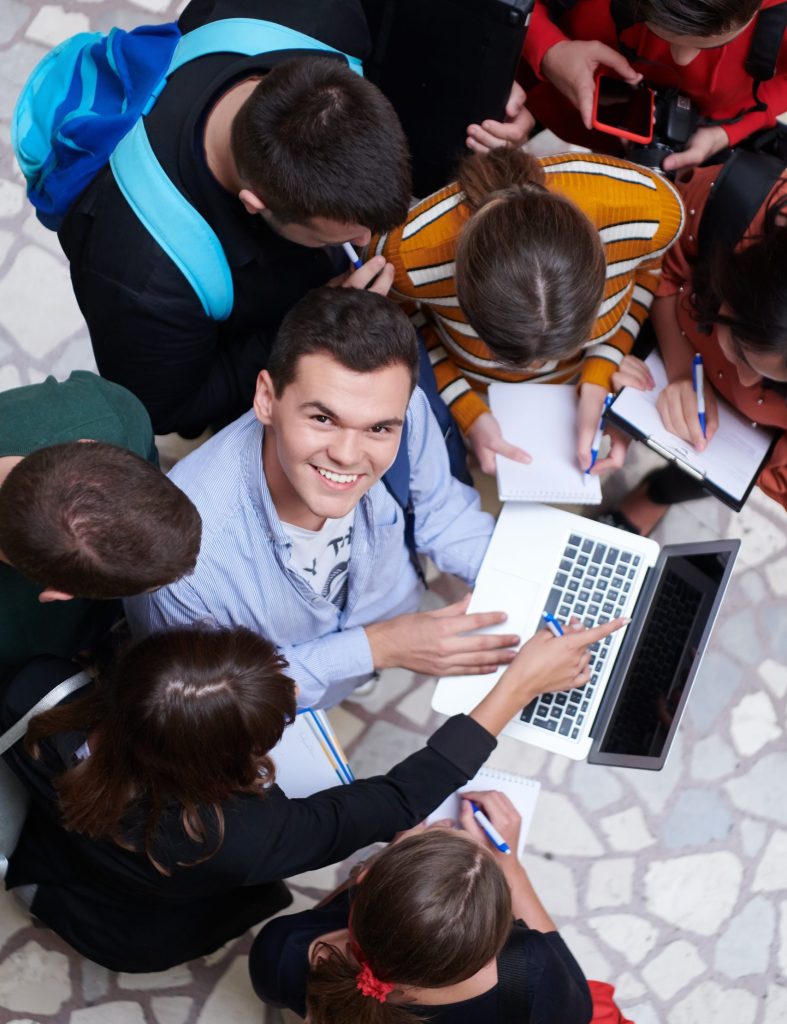 students using modern technology for school project